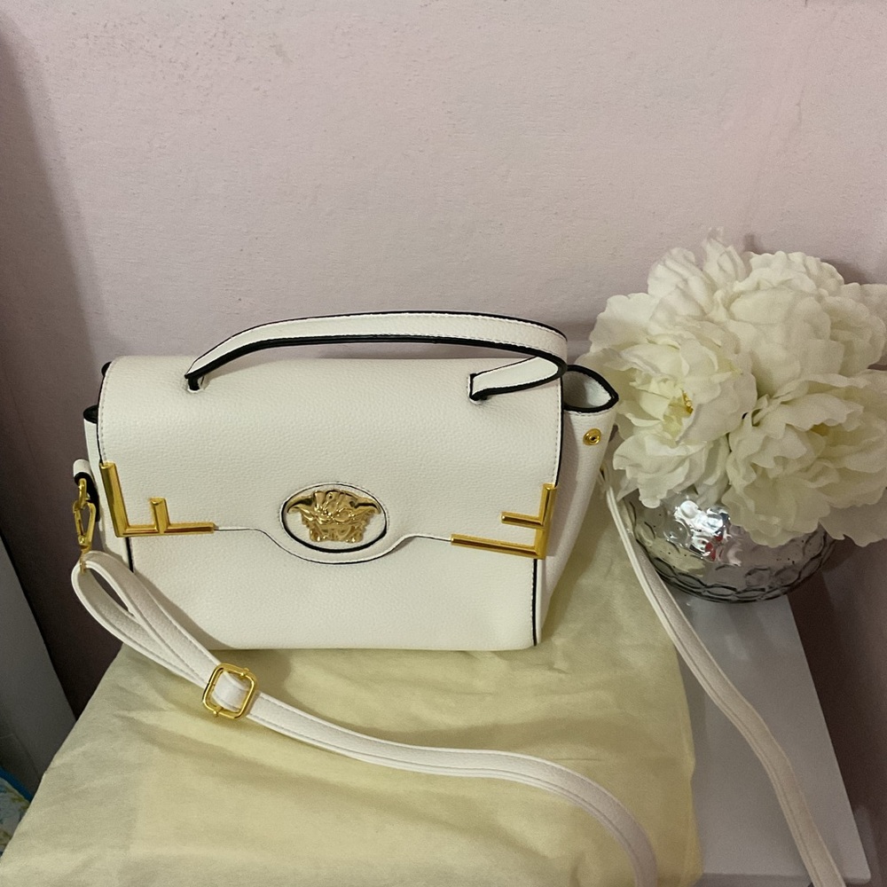 Elegant White Handbag with Gold Accents